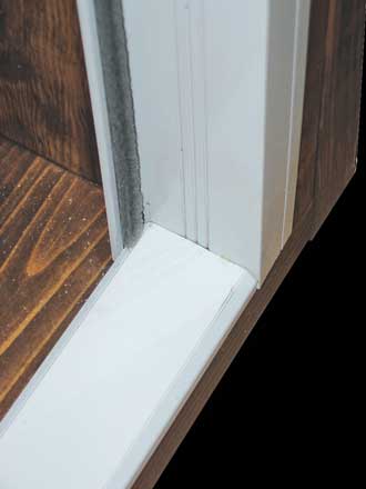 The 1800-Series doors have pile weatherstrip on the jambs to help minimize heat loss/gain.